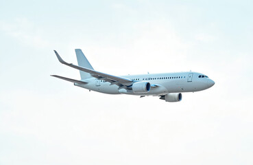 Fototapeta premium White airplane flies in the sky. Commercial passenger jet aircraft travel. Modern air travel, international business, tourism. Transportation industry. Speed trip, high altitude flights.