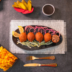 Handmade Lebanese Kibbeh – Crispy Bulgur Shells Stuffed with Spiced Meat