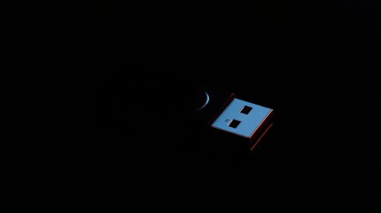 Close-up of a USB Flash Drive in Dramatic Lighting