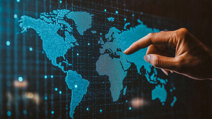 A male hand highlights a location on a glowing digital world blue map, conveying global concepts. The finger pointing at the Europe continent, symbolizing global connectivity and data visualization.