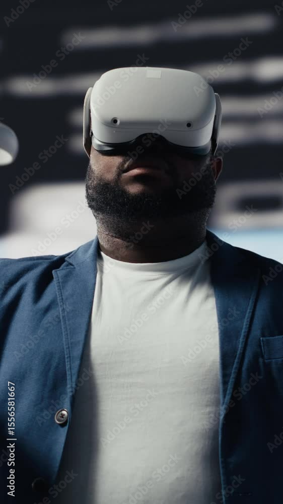 Poster vertical video african american software developer uses virtual reality headset for coding, high tec