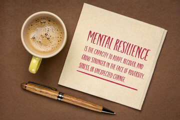 Mental resilience is the capacity to adapt, recover, and grow stronger in the face of adversity, stress, or unexpected change. Note on a napkin.