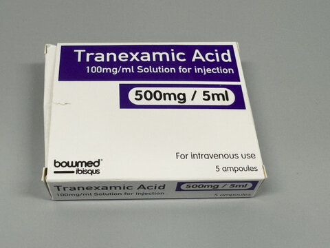 London, UK. June 02 2025. A box of Tranexamic Acid 500mg/5ml solution for injection, manufactured by Bowmed Ibisqus, displayed on a clinical grey surface. Editorial and illustrative editorial.