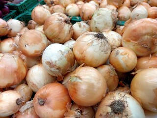Fresh Onions Displayed on a Kitchen Counter Inviting for Culinary Preparation