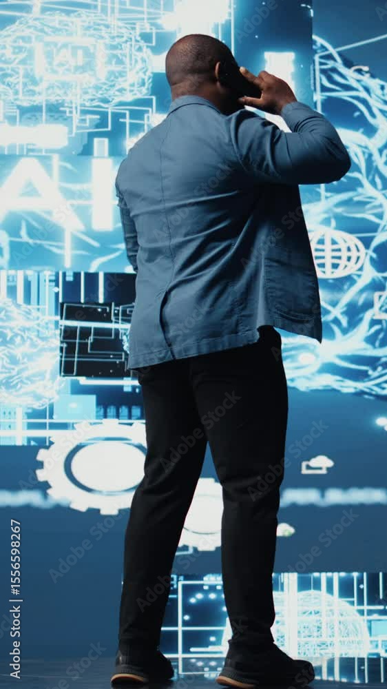 Poster vertical video black entrepreneur using mobile phone call to interact with people, shares insight on