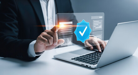 Business man using laptop with check mark verification digital technology security system access