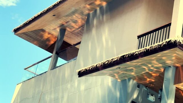 Architectural building exterior detail with reflecting pool lights