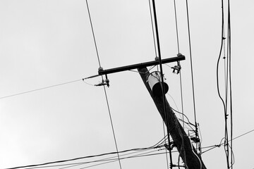 black and white power line telephone pole