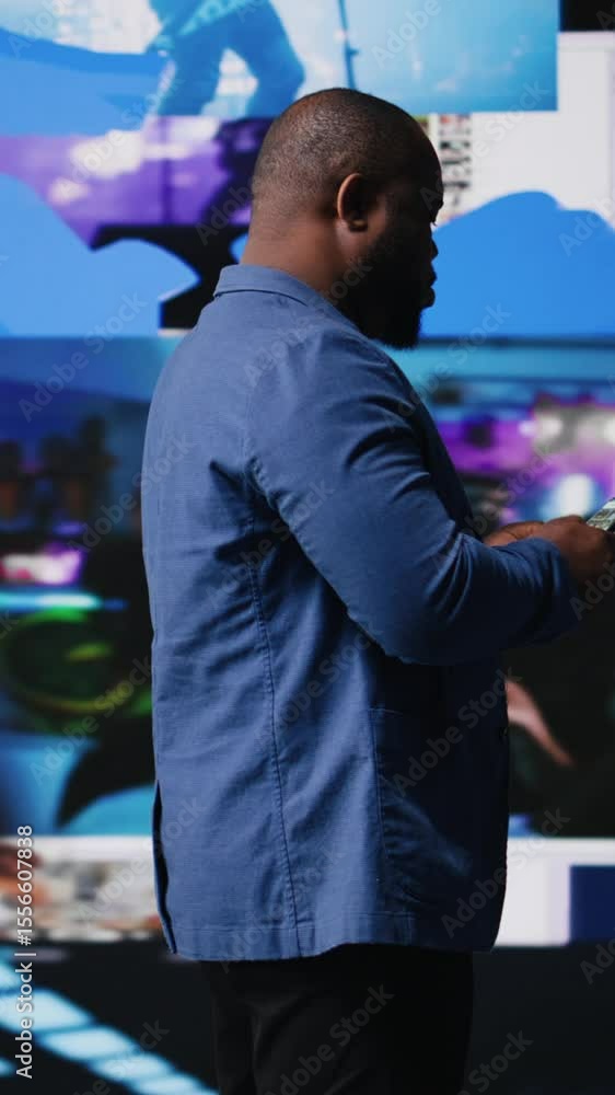 Poster vertical video young social media expert connecting on social network for trends on dashboard, showc
