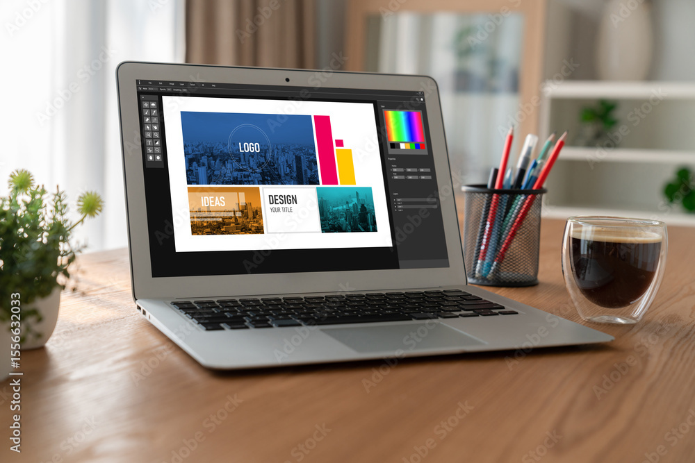Poster graphic designer software for modern design of web page and commercial ads showing on the computer s