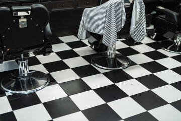 Stylish barbershop interior with classic black and white design elements