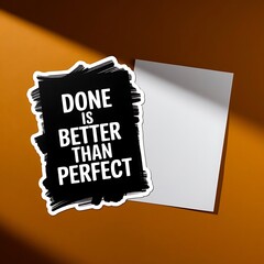 Done is Better Than Perfect—messy yet finished paper next to blank ideal paper, with thick white sticker-style outline around the design, solid black background, high contrast, centered composition