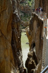 The famous El Caminito del Rey in Malaga with its amazing views with trees, mountains, river and a...
