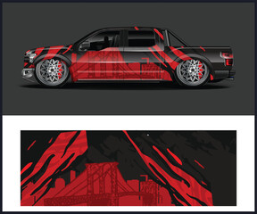 Red and Black Graphic Truck Wrap Design with Bridge