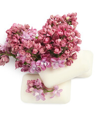 Soap bars and lilac flowers isolated white