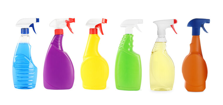 Spray bottles with detergents isolated on white, set
