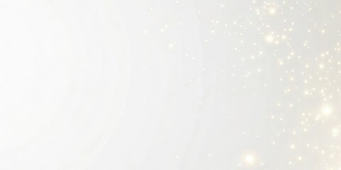 Soft white background with scattered golden sparkling lights and bokeh effect