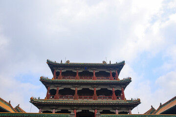 Fototapeta premium The blue glazed tiles on the wall as the background, the traditional architecture