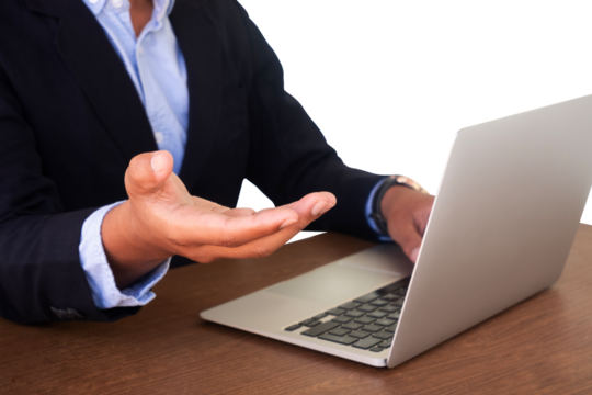an entrepreneur working on a laptop with open palms - Powered by Adobe