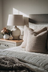 serene bedroom featuring single monochrome textile piece that enhances tranquility