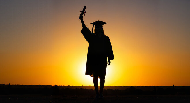 Graduate silhouette sunset