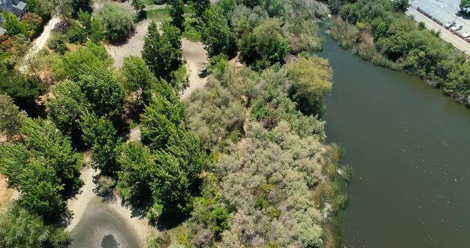 Aerial view of Tule Pond, Fremont, California,  USA and surrounding trees. The image shows the natural beauty of the landscape and the importance of preserving green spaces.