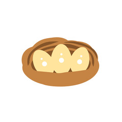 Three yellow eggs nestled in a brown bird s nest isolated on white background