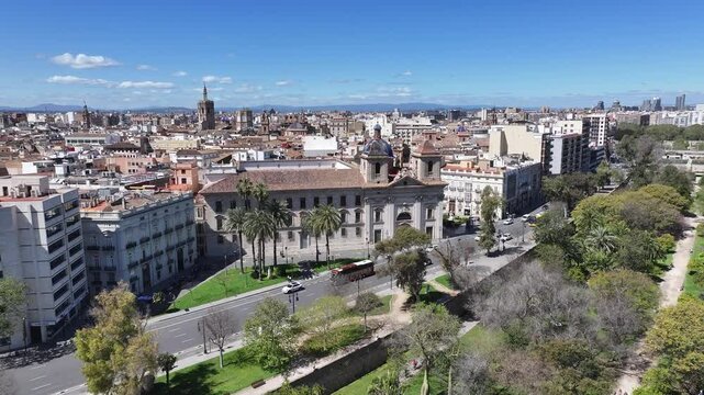 Turia Gardens In Valencia Valence Community Spain. Amazing Skysrapers And Traffic On Street Viewed From Above. Business Sky Downtown Cityscape. Exterior Downtown Famous. Valencia valence community.