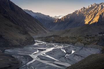 Braided River Flowing Through Rugged Valleys at Sunset in Northern Pakistan