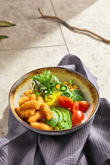 Tempura chicken poke bowl, bright natural lighting, angled flatlay composition on textured surface
