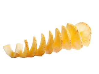 Freshly sliced pineapple rings arranged in a curved line on white background