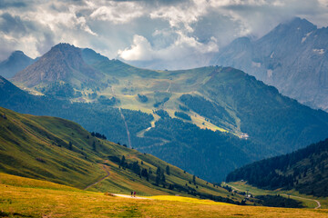 Trekking in Dolomite Alps. Picturesque summer scene of Sella - high mountain pass within the...
