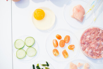 Explore a modern food science lab with fresh samples, test tubes, and microscopes. Ideal for biotechnology