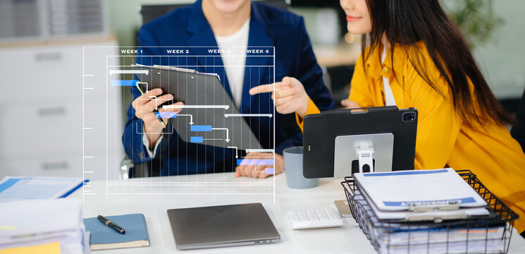 Project manager working and update tasks with milestones progress planning and Gantt chart