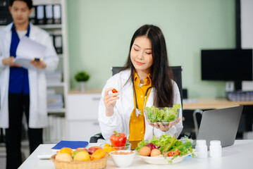Doctors sharing fresh vegetables, promoting health and nutrition. Ideal for wellness, healthcare,...