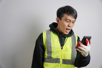 an angry worker with a smartphone