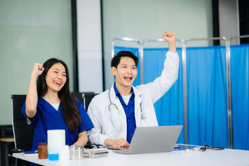 Professional healthcare team consultation a doctor and nurse collaborating in a clinic, discussing...
