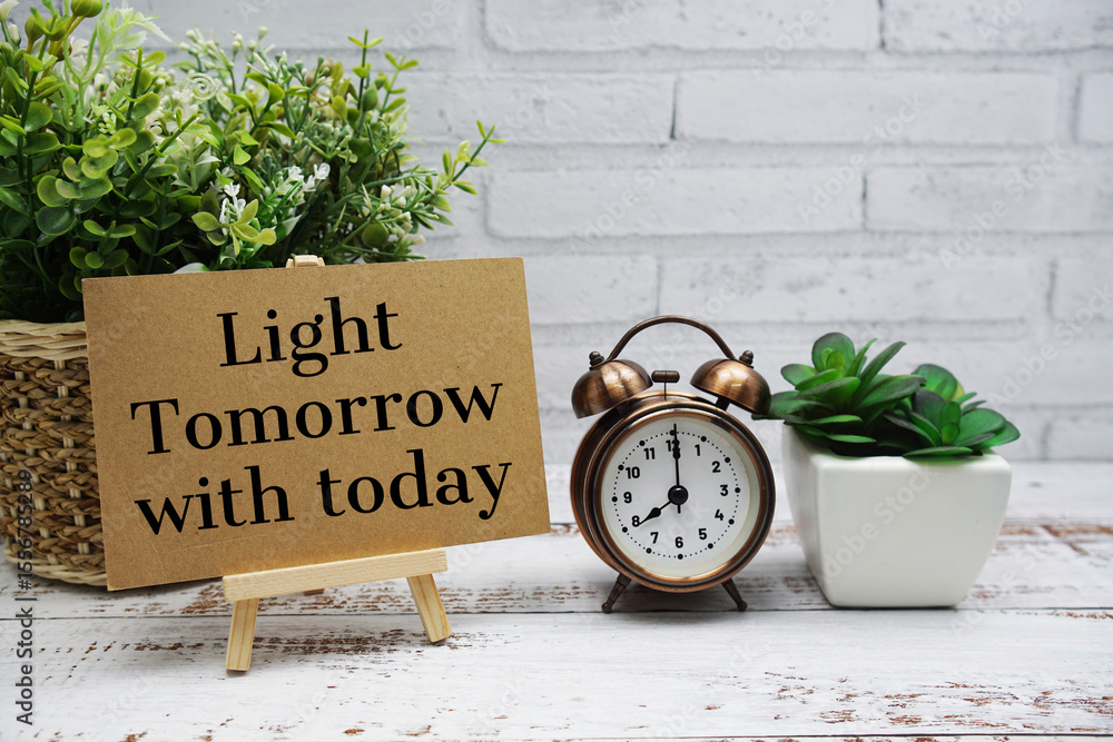 Poster light tomorrow with today text message with easel stand on wooden background