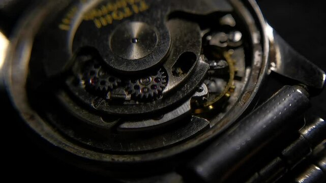 Old watch mechanism on black