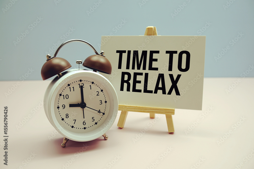 Poster time to relax text on paper card with alarm clock on pink background