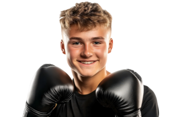 Young Male Boxer with Gloves Smiling and Ready to Fight in a Studio Setting with Isolated Background