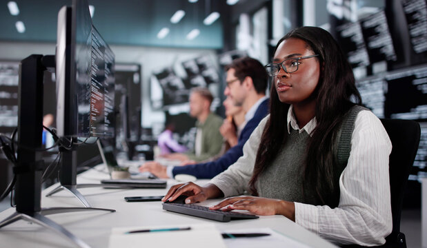 Young African American Coder Explaining New Software Development