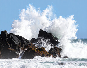 Explosive Ocean Waves Colliding with Rocky Shoreline, isolated on transparent background