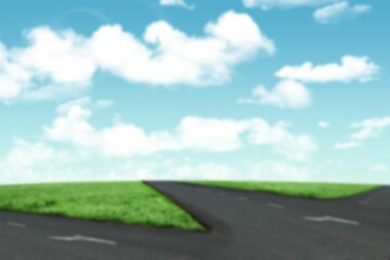 Scenic view of forked road against sky