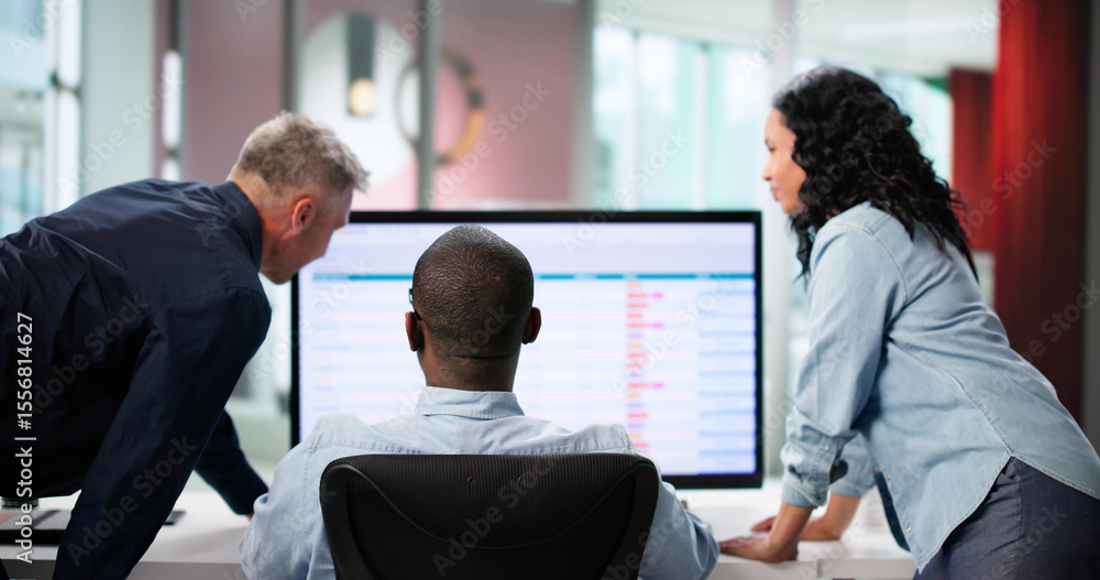 Poster Analyzing Data On Multiple Computer Screens