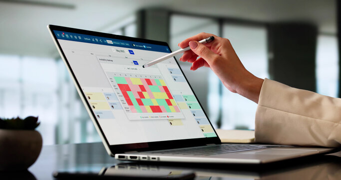 Young Woman Analyzes Data Availability Using Computer Heatmap Analytics