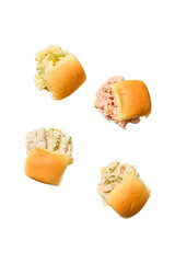 Four different types of salad sandwiches on slider buns isolated on transparent background