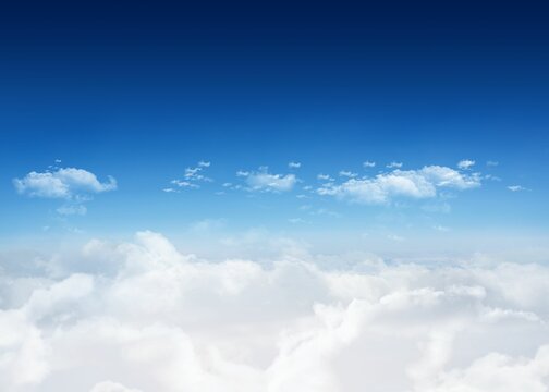 Fototapeta Bright blue sky over clouds