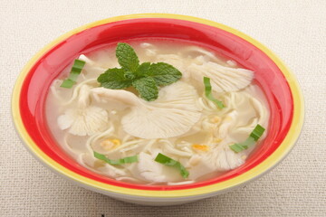 Homemade delicious organic mushroom clear soup . 