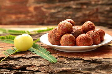 Homemade pickled gooseberry sourced from wild . amla achar.  